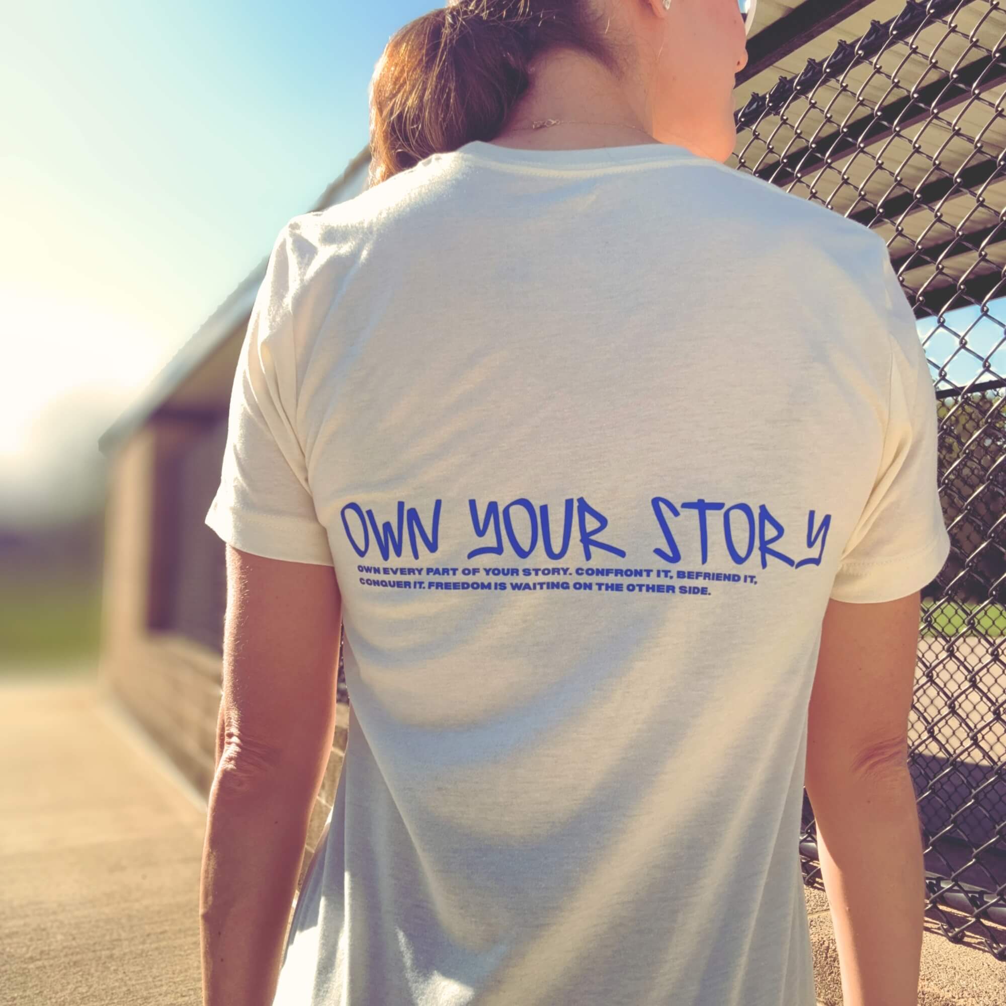 OWN YOUR STORY TEE
