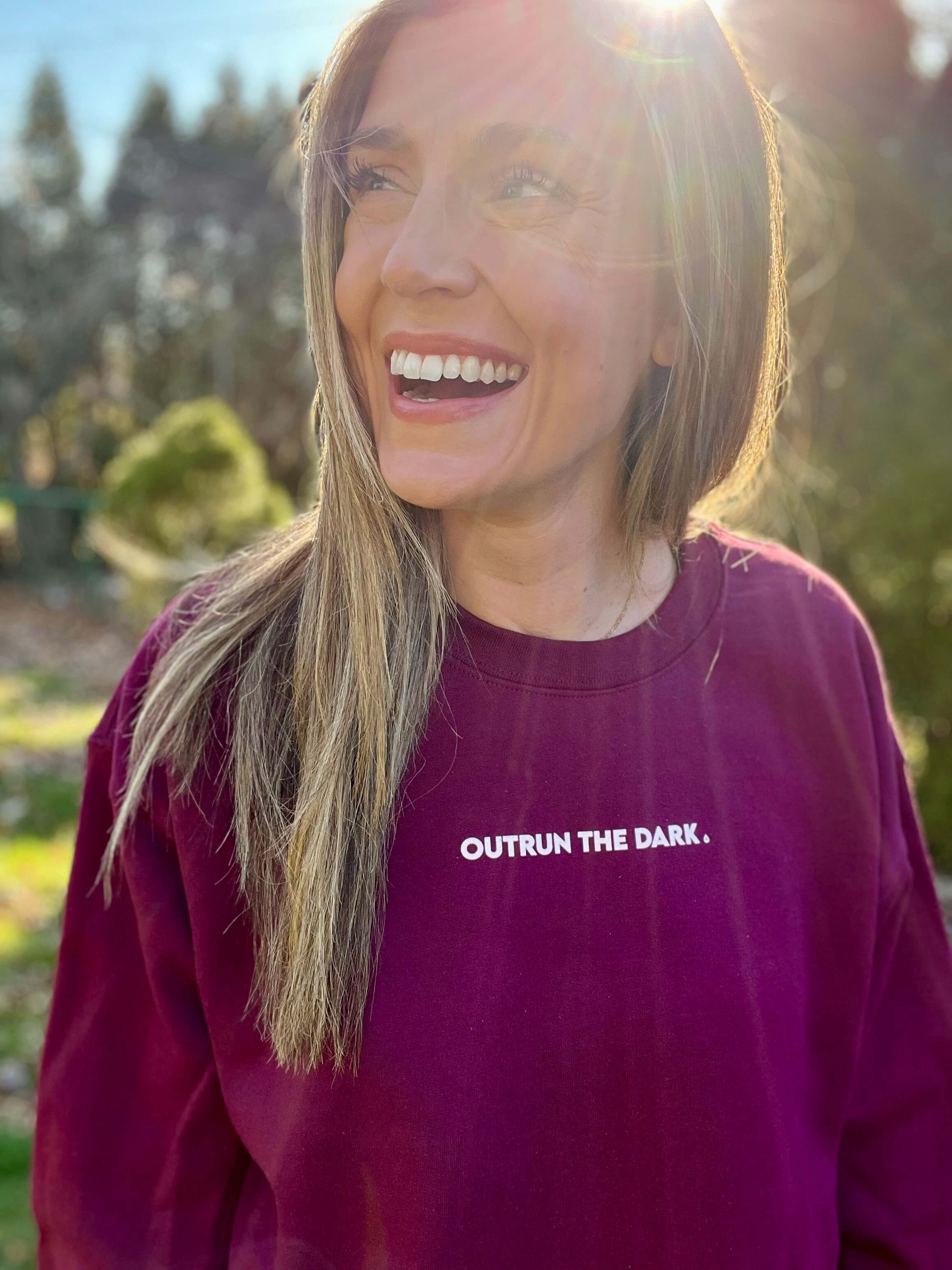 Outrun the dark Women's Sweatshirt
